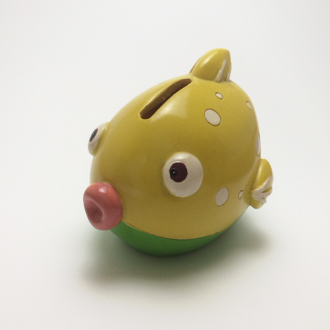This photo of an absolutely adorable fish piggy bank was taken with an iPhone and a homemade cardboard and tissue light box.