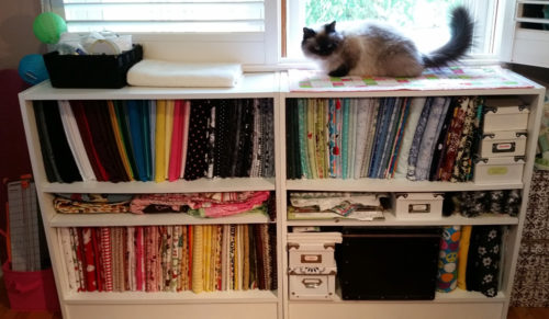 fabric-storage-on-bookshelves