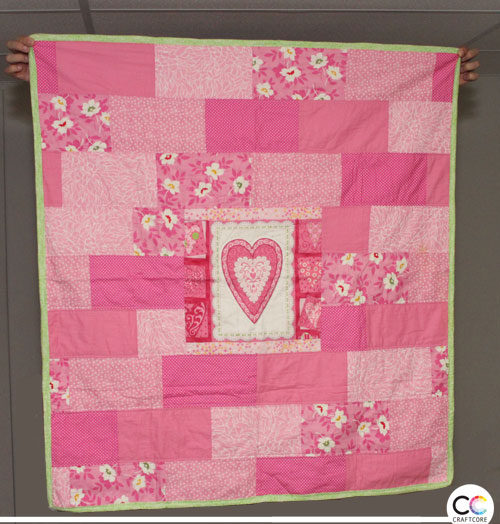 Craftcore | Heart Panel Pink and Green quilt with simple brick layout