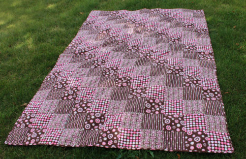 Craftcore pink and brown polka dot quilt - diagonal repeating pattern with square blocks