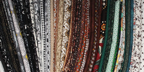 How to Save Money on Craft Supplies - Yard sale fabrics
